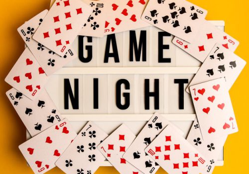game-night-text-lightbox-with-playing-cards_335904-347